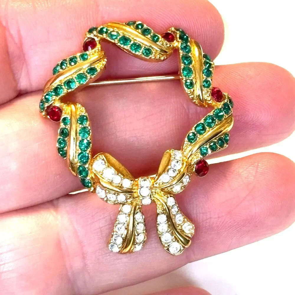 Vintage Monet Christmas brooch gold with green red white rhinestones wreath pin
